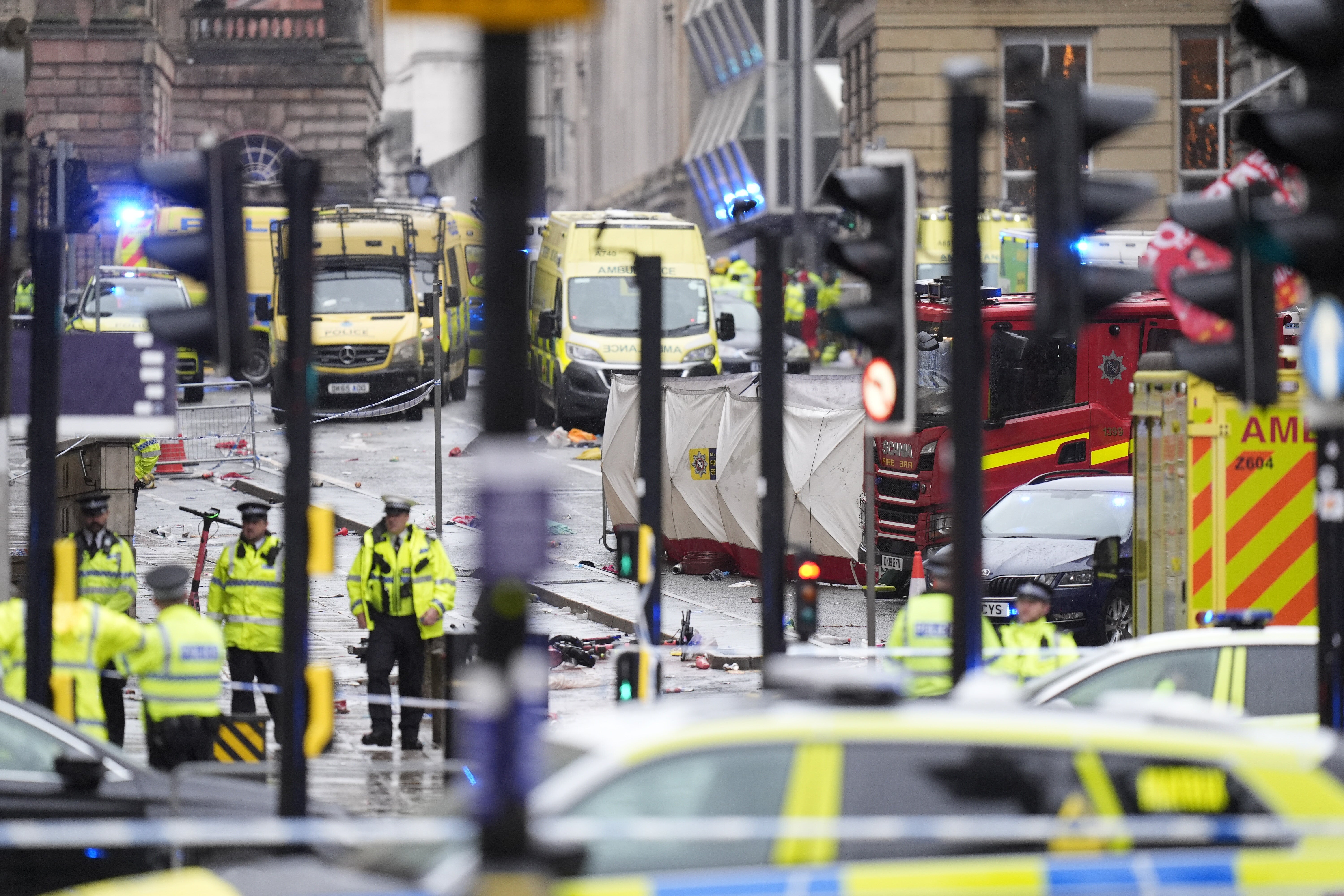 <p>Police and emergency personnel at the scene on Water Street, Liverpool </p>