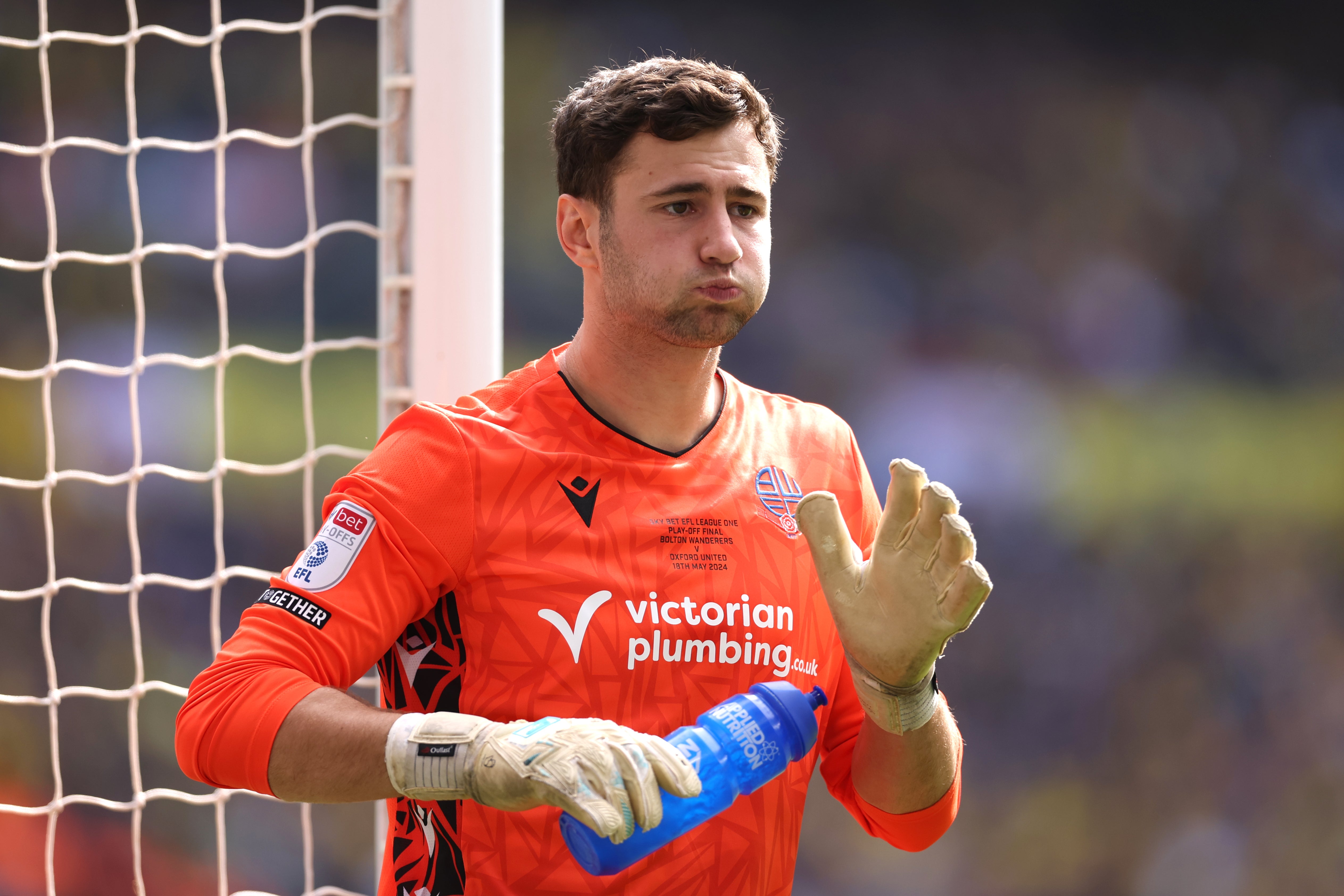 Goalkeeper Nathan Baxter has left Bolton Wanderers
