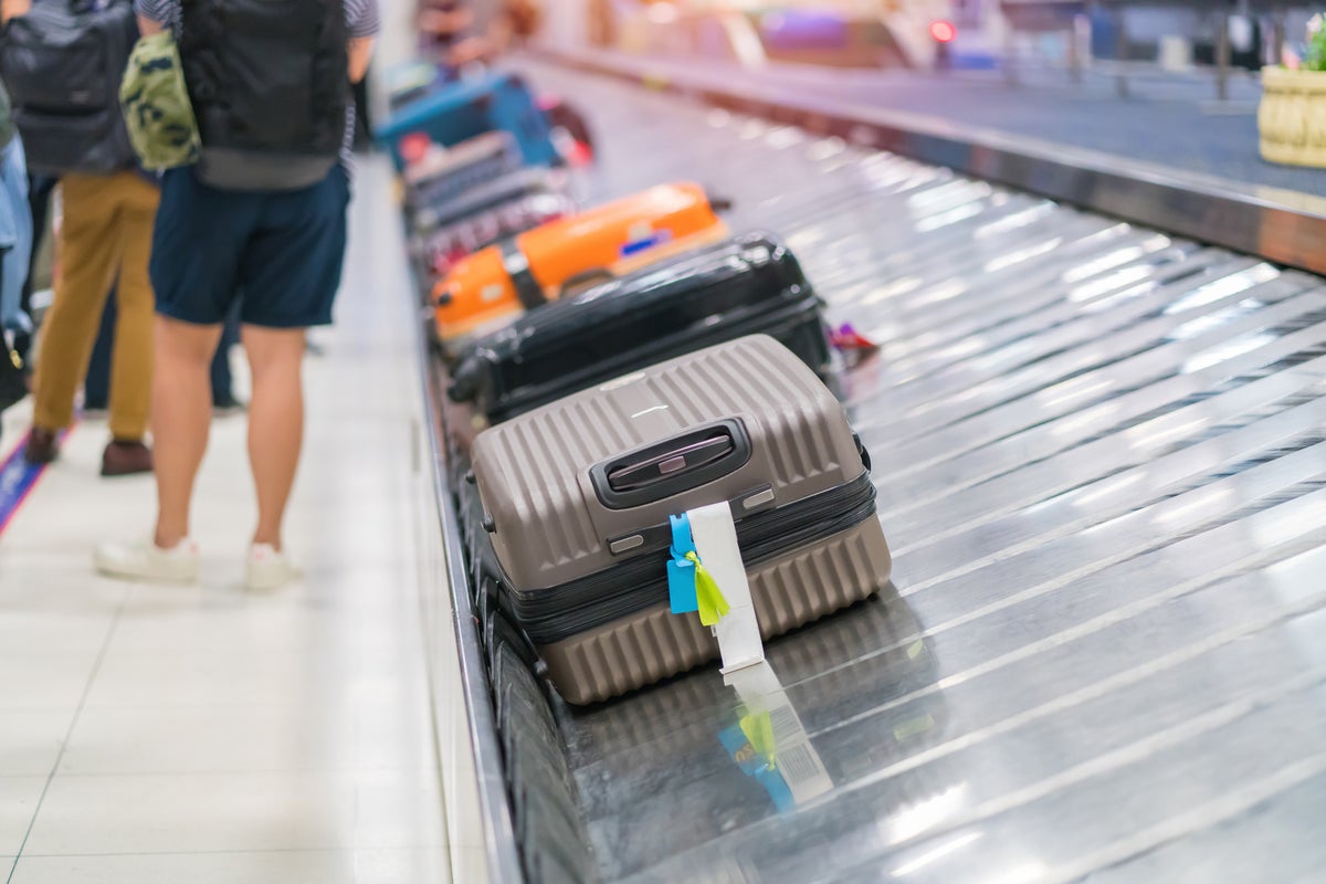 Child, 2, slips behind JetBlue ticket counter to go for joyride on conveyor
