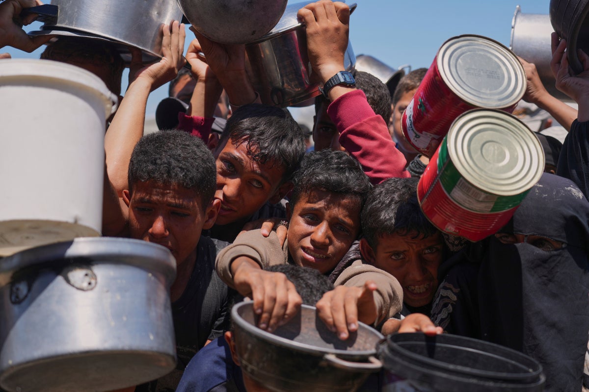 AP PHOTOS: Palestinians struggle to get food even as aid trickles in
