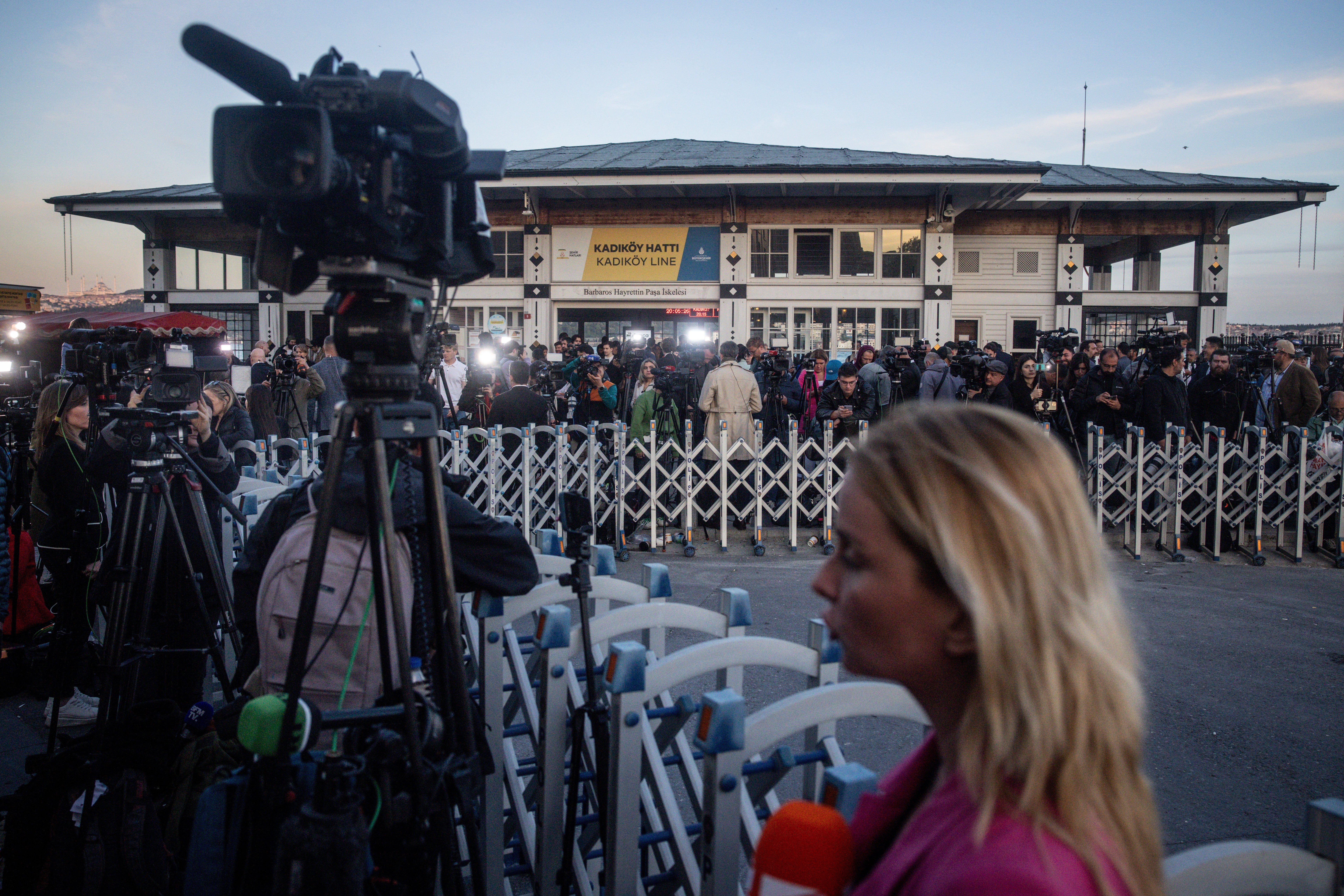 Journalists wait for the arrival of Ukrainian, American and Russian delegates at the office of Turkish President in Dolmabahce Palace in Istanbul