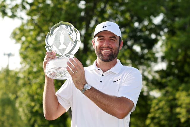 <p>Scottie Scheffler with his Memorial Tournament trophy</p>