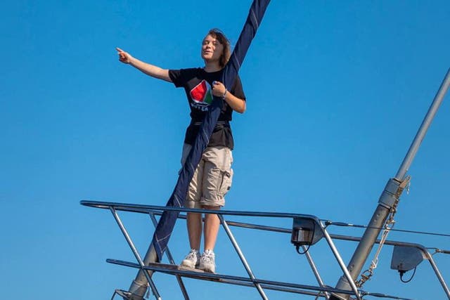 <p>Activist Greta Thunberg stands aboard the aid ship ‘Madleen’</p>