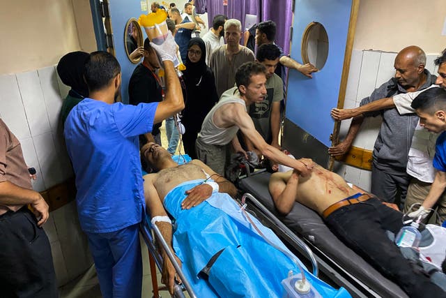 <p>Palestinians injured by Israeli fire near a Rafah aid distribution centre on 3 June receive treatment at the Nasser hospital in Gaza</p>