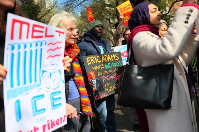 <p>Protesters in New York rally against plans from Mayor Eric Adams to open the notorious city-run jails on Rikers Island to ICE agents. A state judge is putting those plans on hold, for now</p>