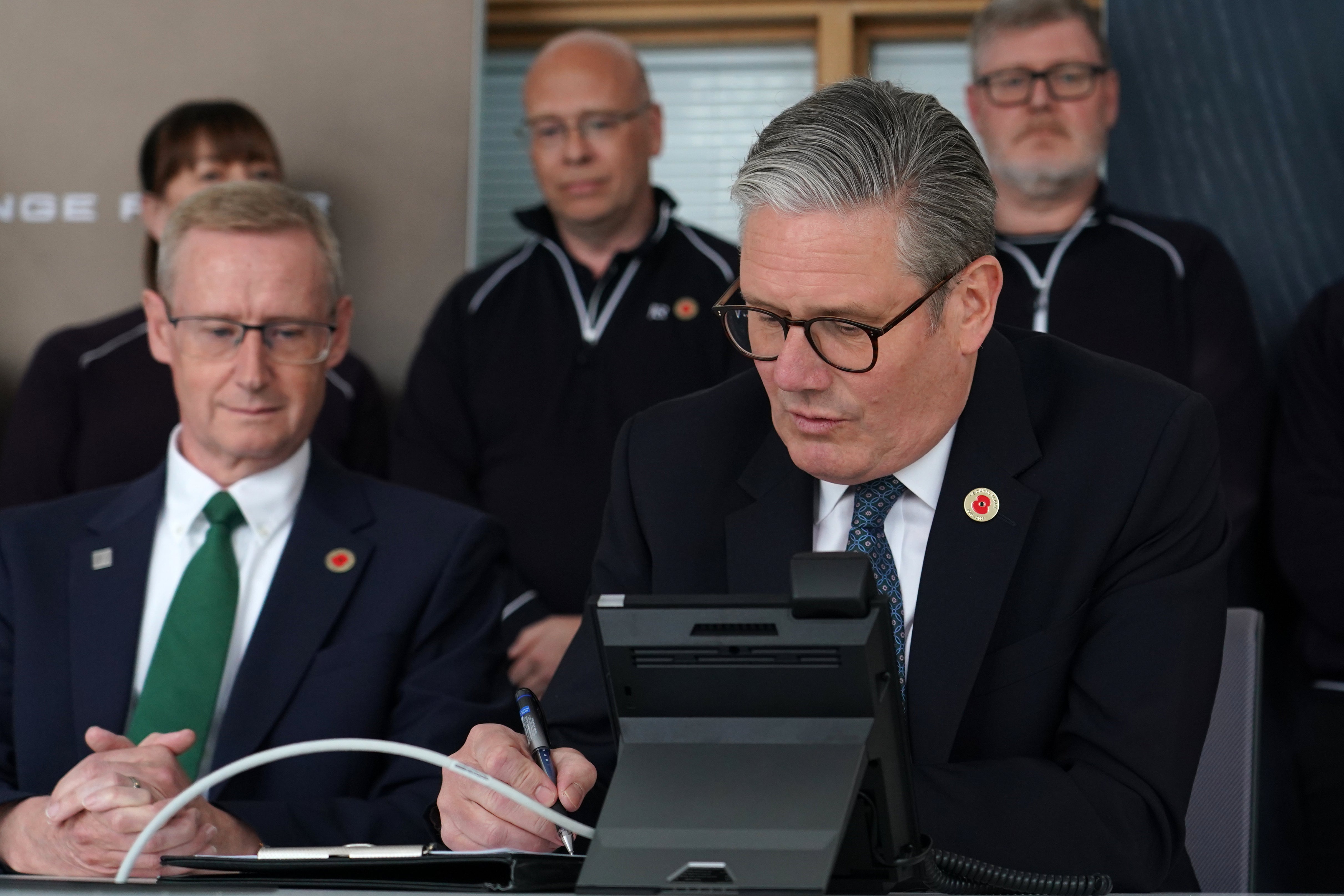 Prime Minister Sir Keir Starmer speaking on the phone to US President Donald Trump announcing the deal (Alberto Pezzali/PA)