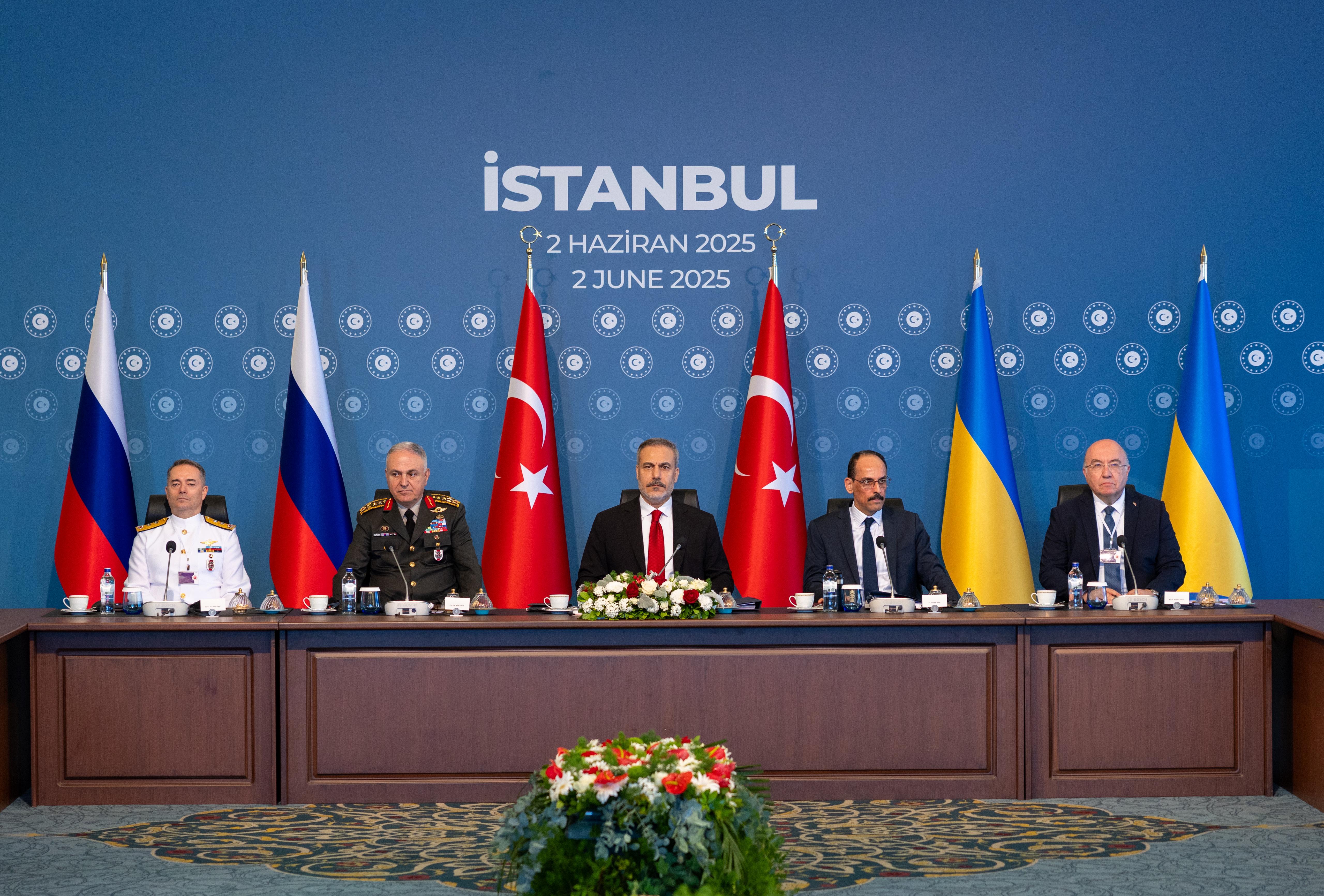 Members of Ukrainian and Russian delegations attend peace talks presided over by Turkish foreign minister Hakan Fidan at Ciragan Palace in Istanbul
