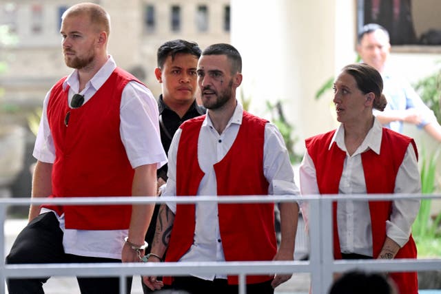 <p>British nationals, from left, Phineas Ambrose Float, Jonathan Christopher Collyer and Lisa Ellen Stocker are brought to court for their trial in Denpasar, Bali</p>
