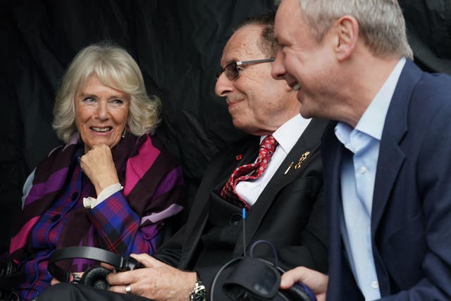 Camilla met author Peter James, centre, and actor John Simm while Grace was being filmed in 2021 (Gareth Fuller/PA)