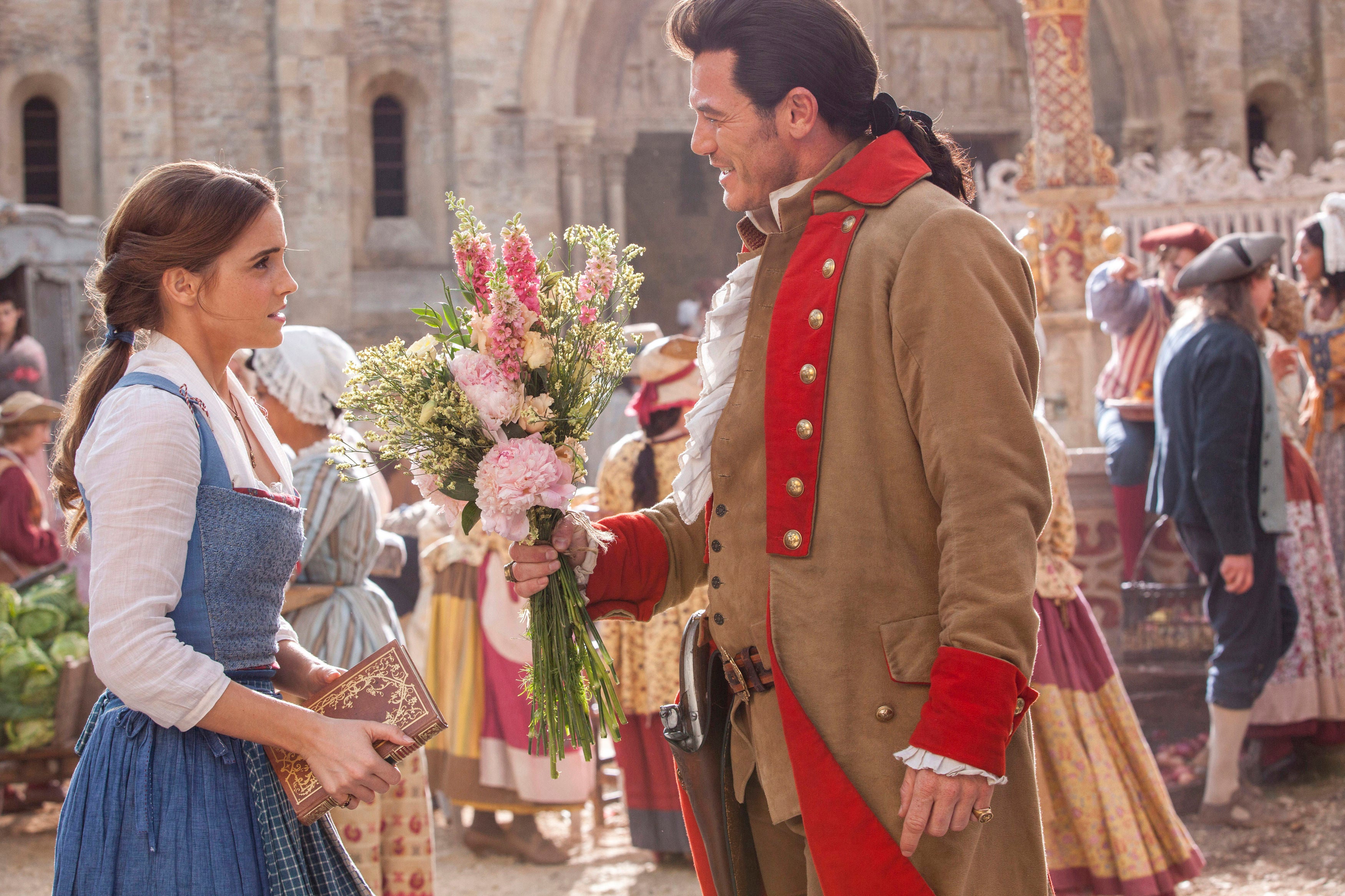 <p>Emma Watson as Belle and Luke Evans as Gaston in Beauty And The Beast </p>