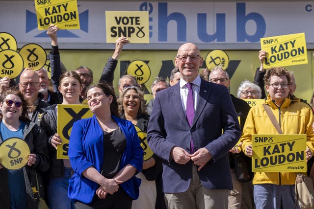 John Swinney was in Hamilton on Wednesday with SNP by-election candidate Katy Loudon (Jane Barlow/PA)