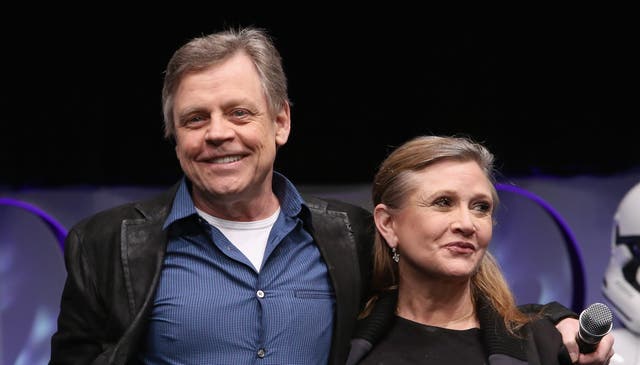 <p>Star Wars co-stars Mark Hamill and Carrie Fisher pictured in 2015, a year before Fisher's tragic death</p>