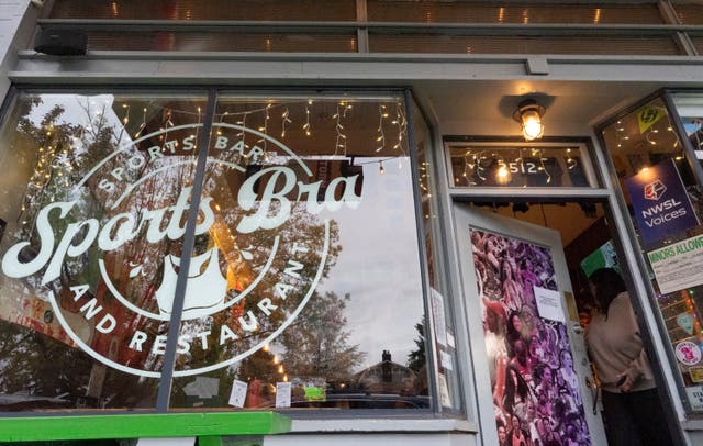 <p>A customer leaves The Sports Bra in Portland, Oregon</p>