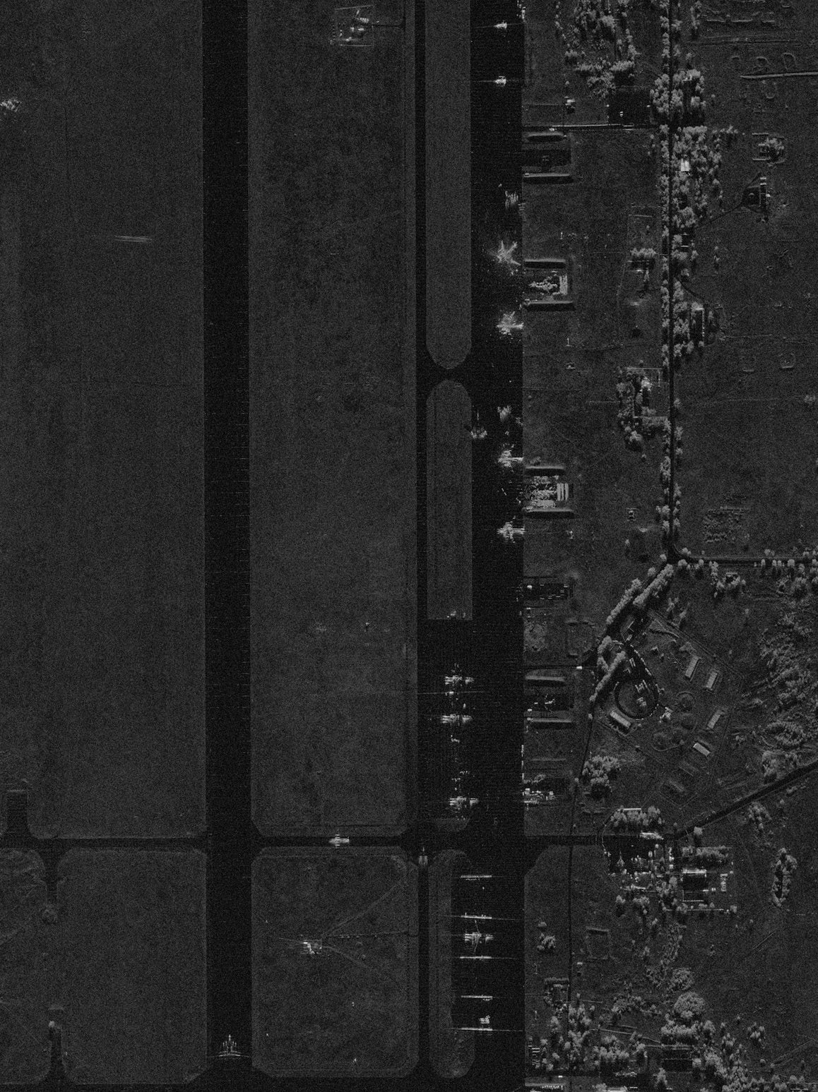 Satellite image shows damaged Russian aircraft of the Belaya airfield after a Ukrainian drone attack
