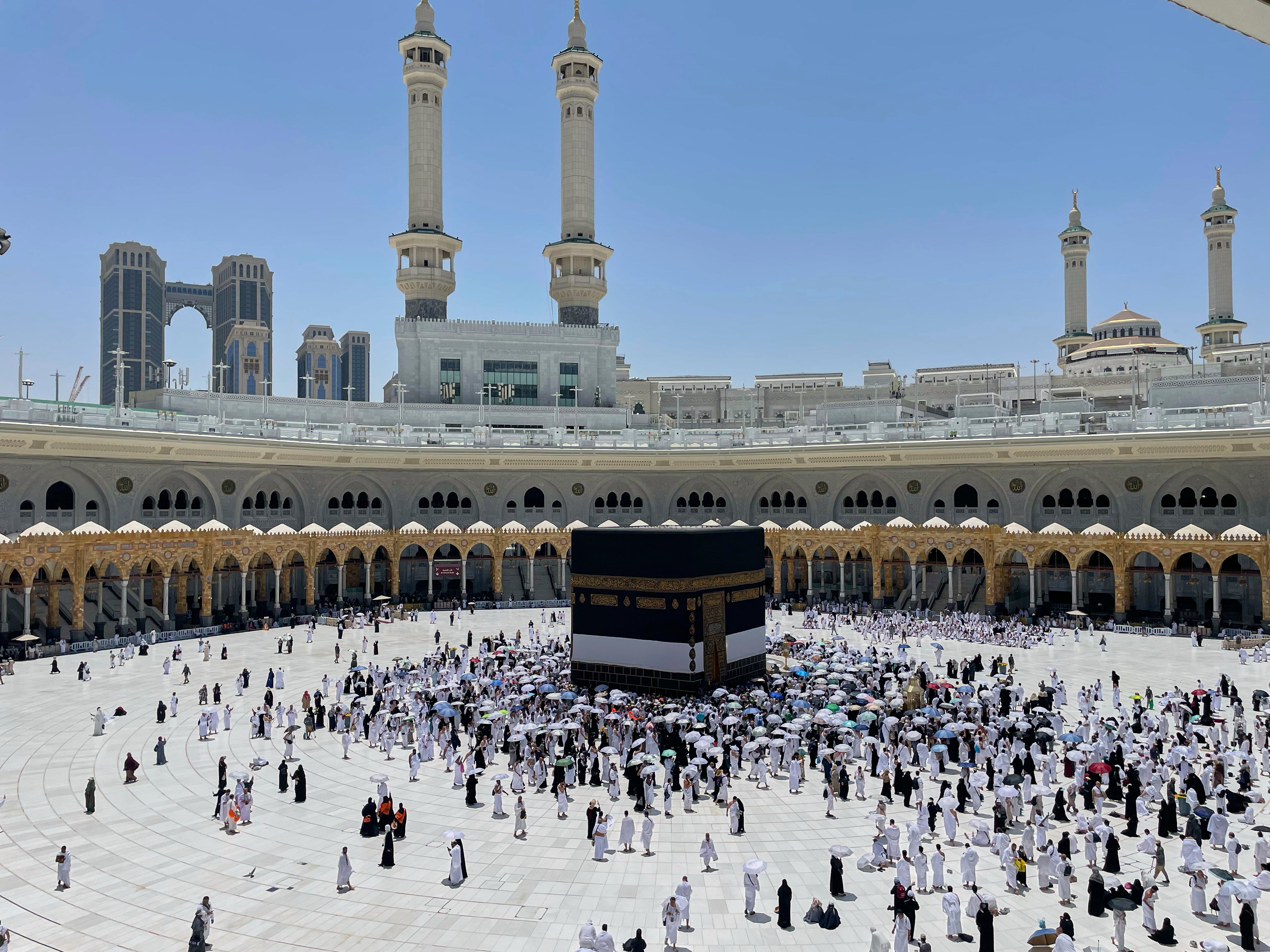 Muslim pilgrims walk around the Kaaba, the cubic building at the Grand Mosque, during the annual Hajj pilgrimage, in the Muslim holy city of Mecca, Saudi Arabia, Wednesday, June 4, 2025. (AP Photo/Amr Nabil)