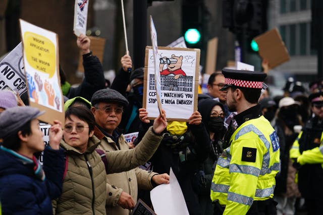 People protest outside the proposed site of the new Chinese Embassy in London (Jordan Pettitt/PA)