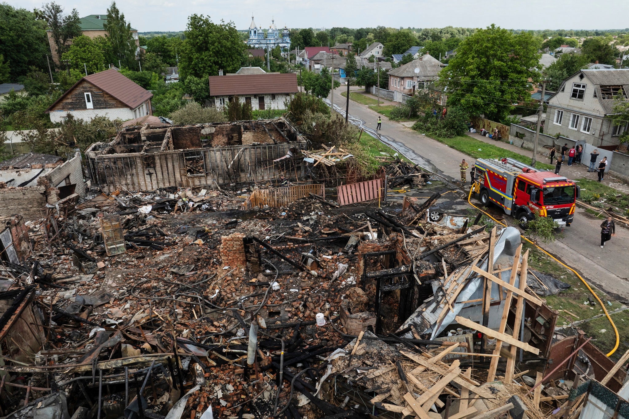 Residential houses are seen destroyed after a Russian drone strike in Pryluky village, Ukraine