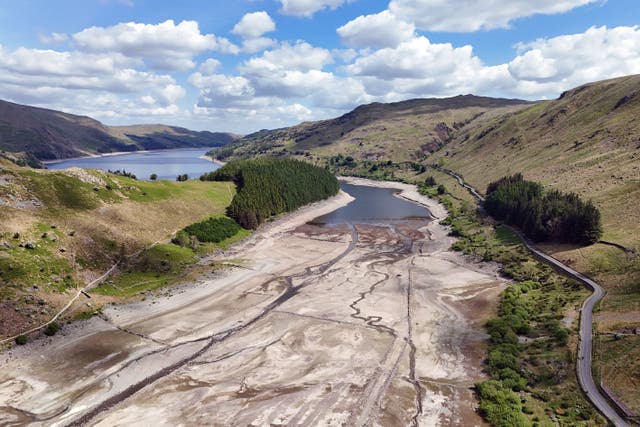 A view of Haweswater reservoir in Mardale, Cumbria, in late May, with extremely low water levels (Owen Humphreys/PA)