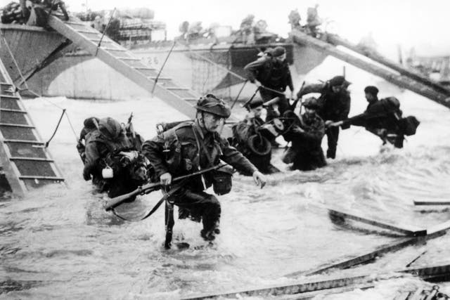 <p>Troops from the 48th Royal Marines at Saint-Aubin-sur-mer on Juno Beach, Normandy, France, during the D-Day landings, 6th June 1944. (Photo by Hulton Archive/Getty Images)</p>