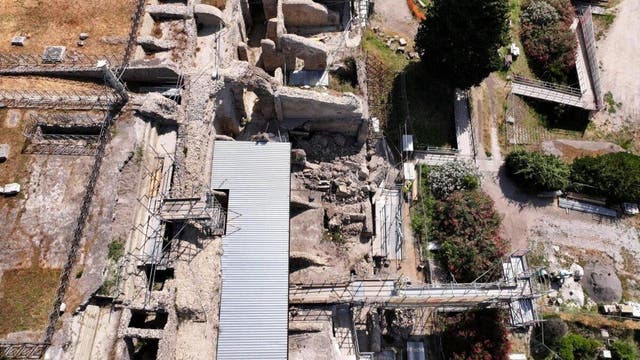 <p>A drone view shows the partial collapse of a wall and a portion of a vault in the insula Meridionalis of the archaeological area of Pompeii, following a seismic swarm in the Campi Flegrei</p>