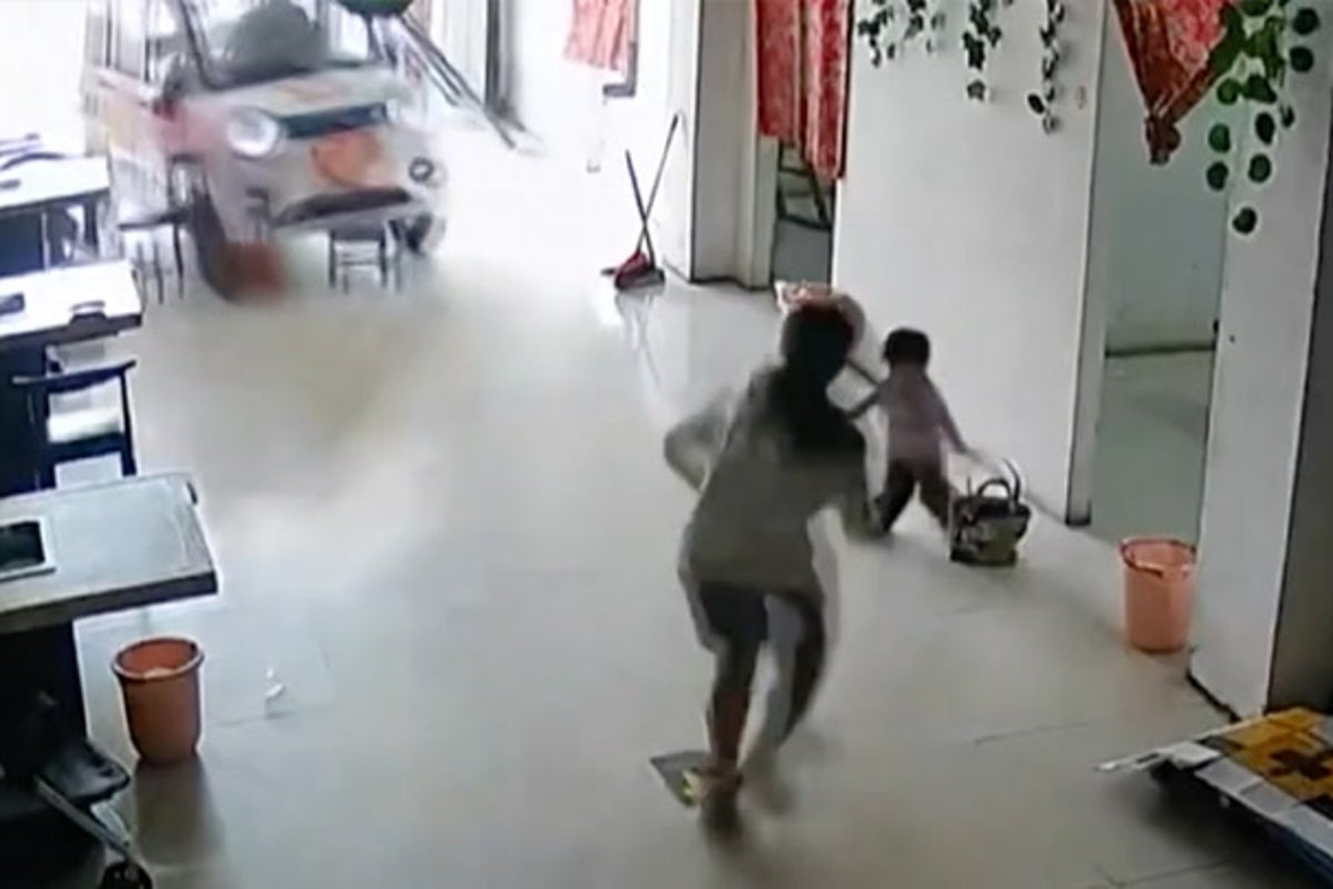 Moment girl, 11, narrowly saves baby sister from runaway vehicle in last-second rescue