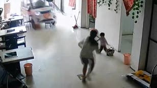 Moment girl, 11, narrowly saves baby sister from runaway vehicle