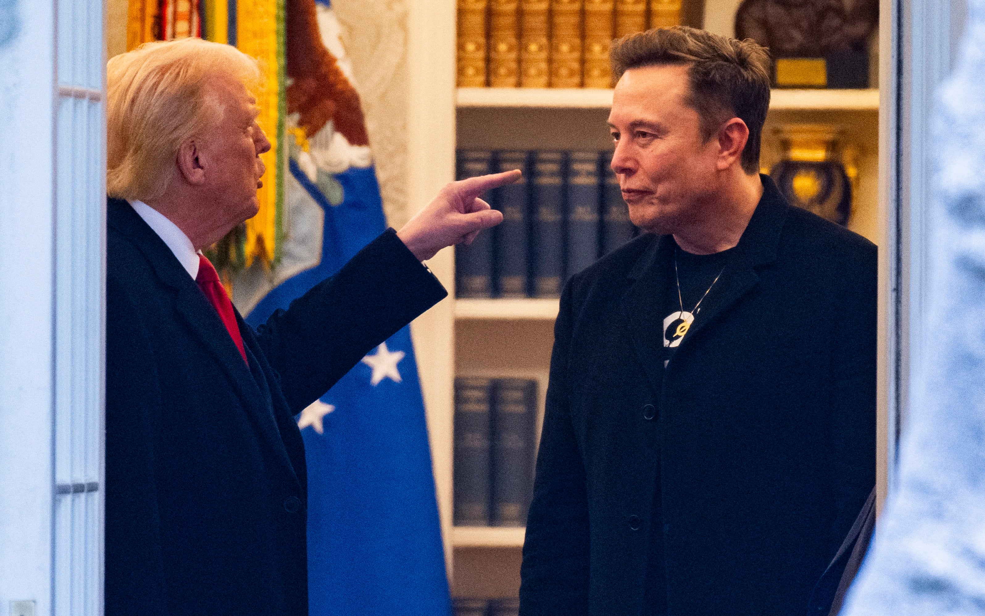 <p>Trump and Musk talking</p>