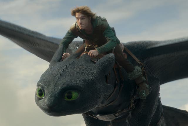 <p>In the grey: Mason Thames and his dragon in ‘How to Train Your Dragon’</p>