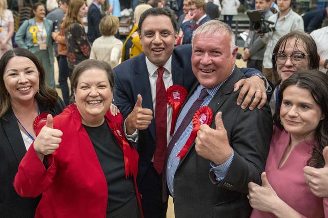 <p>Davy Russell (centre, right) celebrates with Scottish Labour leader Anas Sarwar (centre) and deputy leader Jackie Baillie (left, centre)</p>