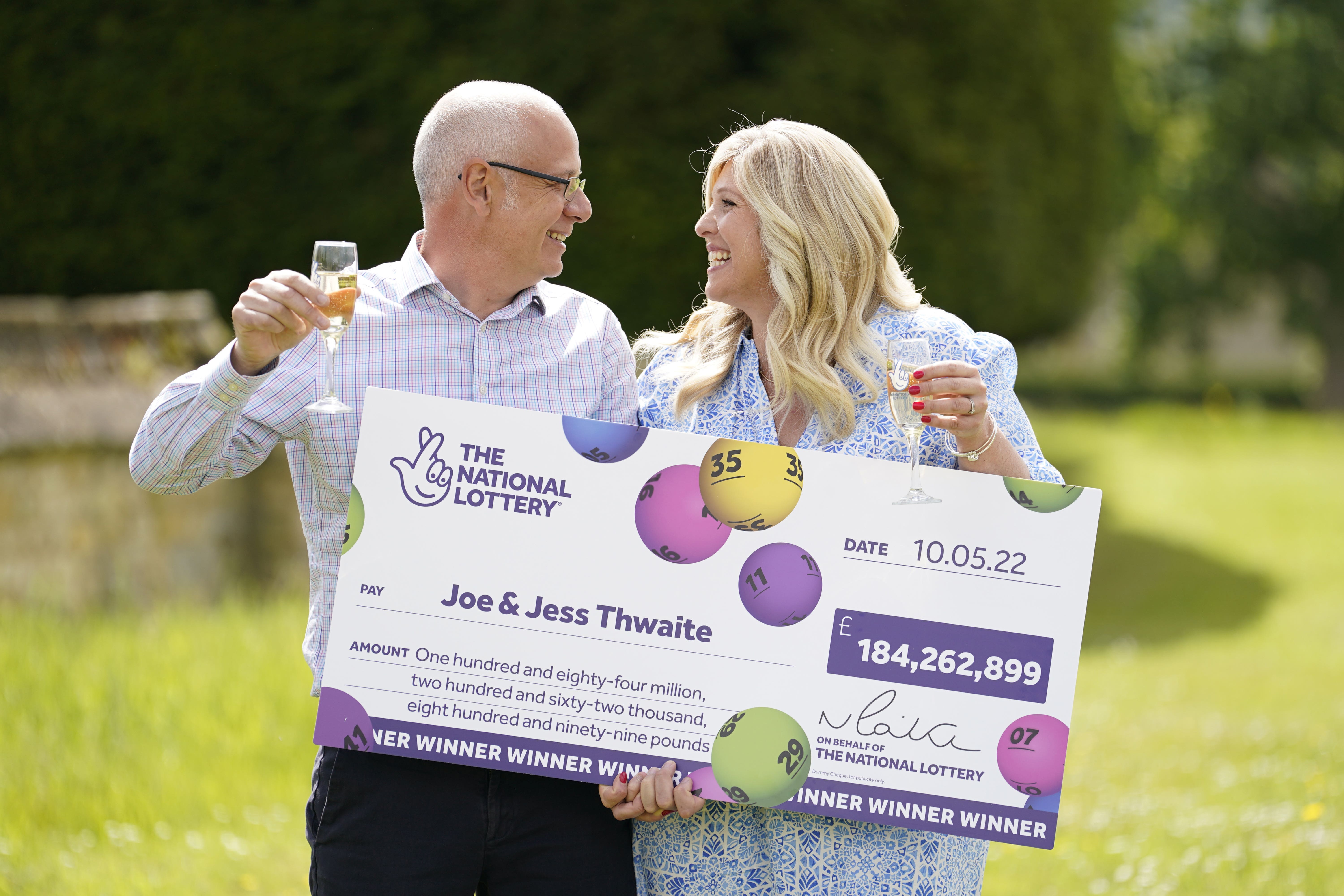 Joe Thwaite, 49, and Jess Thwaite, 46, from Gloucestershire celebrate after winning the record-breaking EuroMillions jackpot of £184M from the draw on Tuesday 10 May, 2022 (PA)