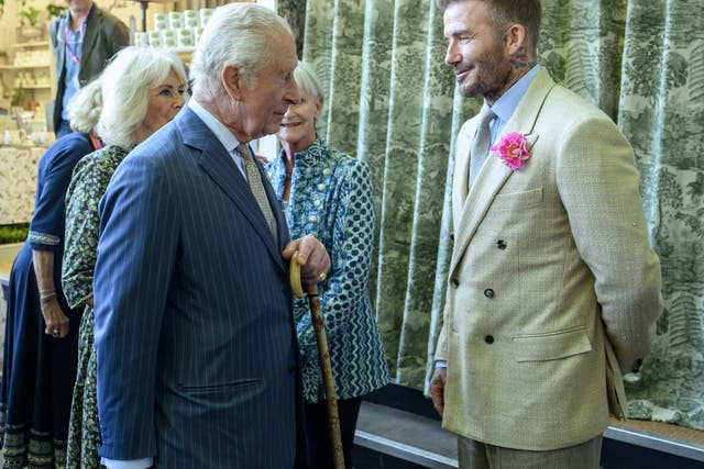 The King meets David Beckham during a visit to the RHS Chelsea Flower Show on May 19 (Paul Grover/Daily Telegraph) (PA)