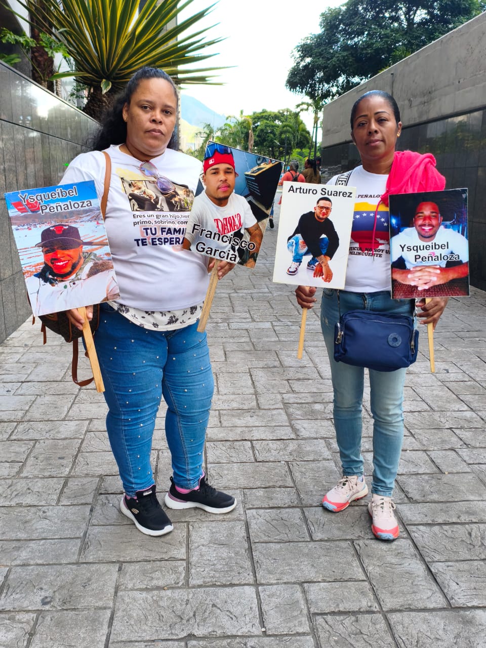 Ydalis Chirinos Polanco (right) spends much of her time organizing with fellow Venezuelan families who have loved ones in CECOT