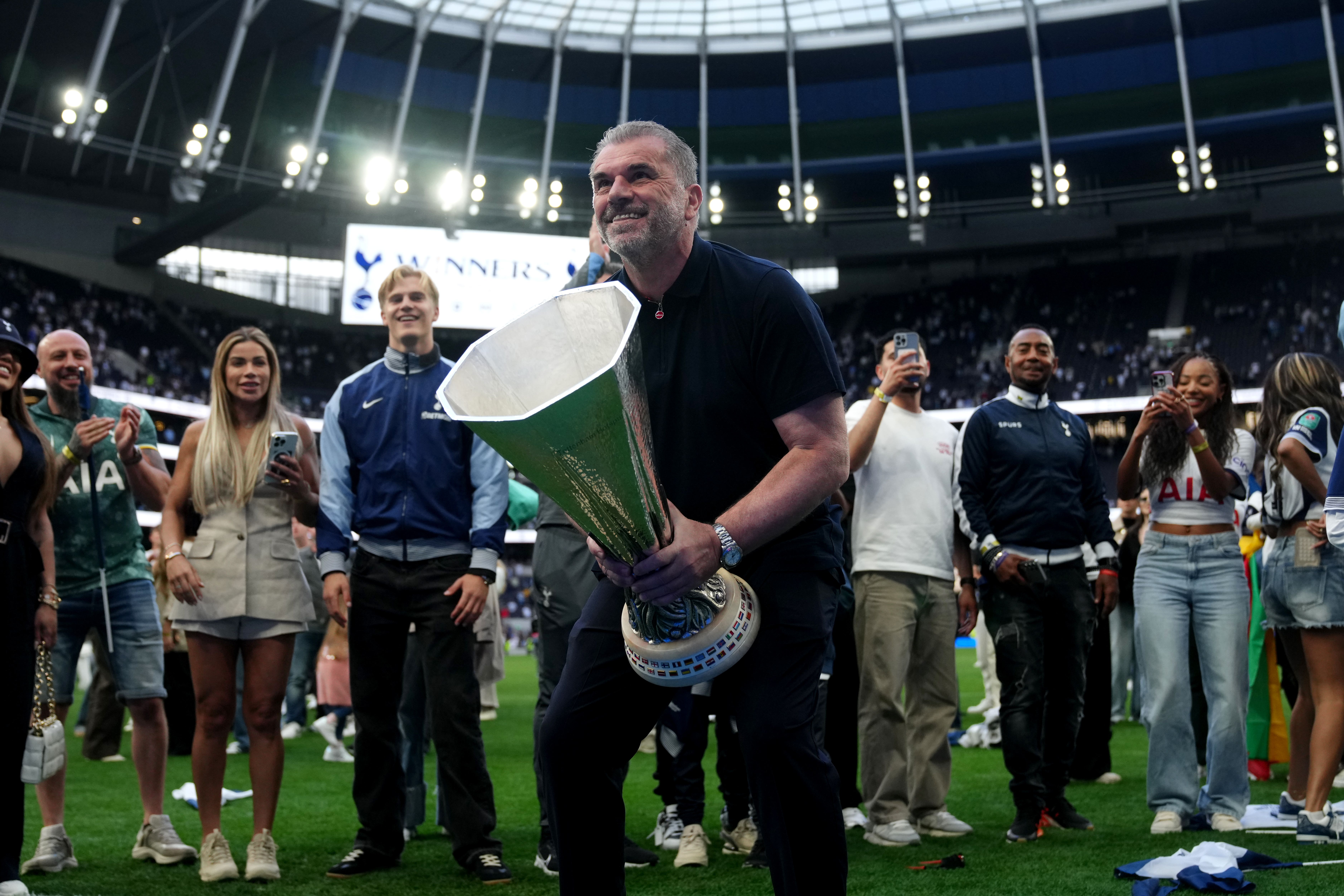 Ange Postecoglou with the Europa League trophy at Tottenham Hotspur Stadium