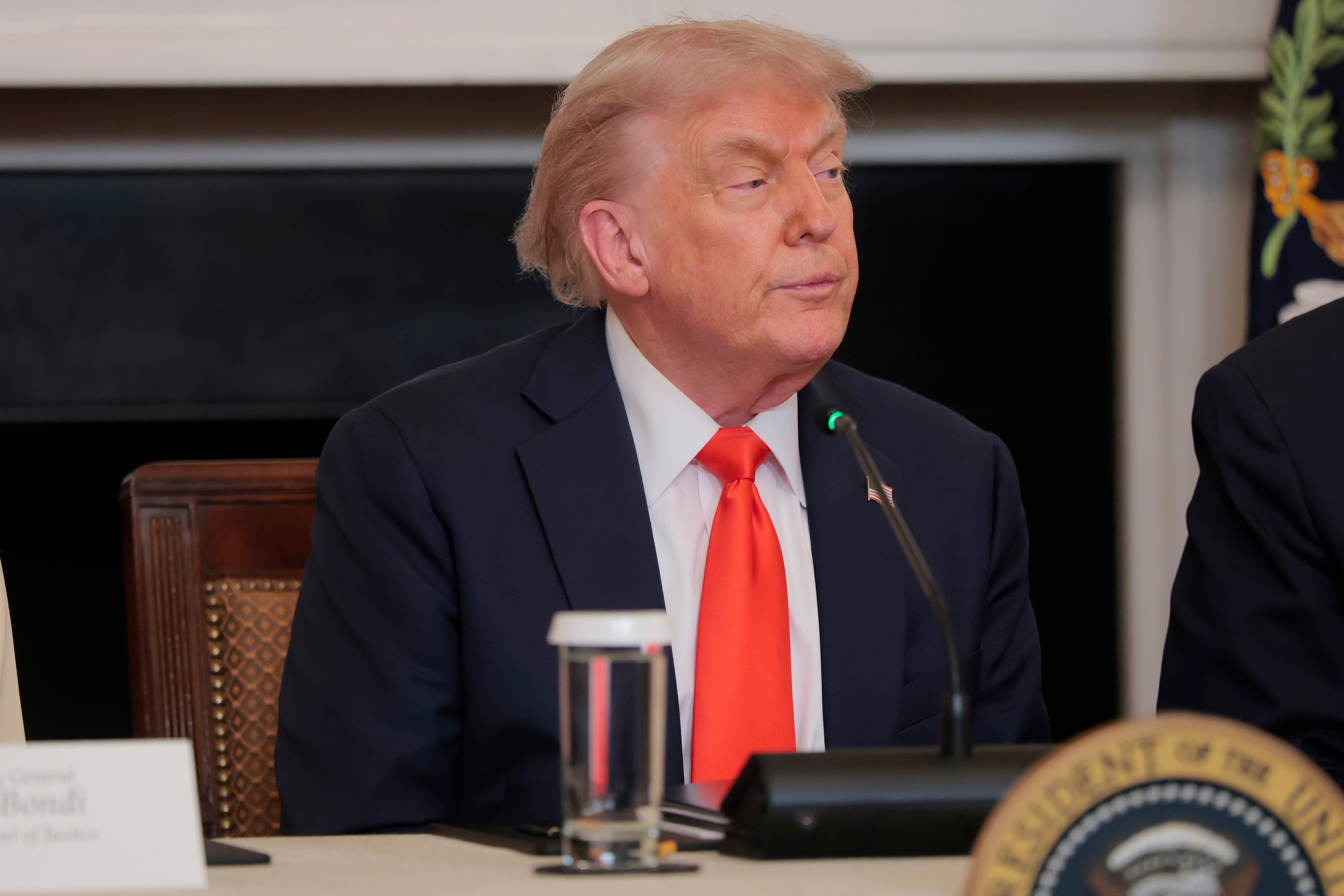 Donald Trump speaks at a roundtable in the State Dining Room at the White House