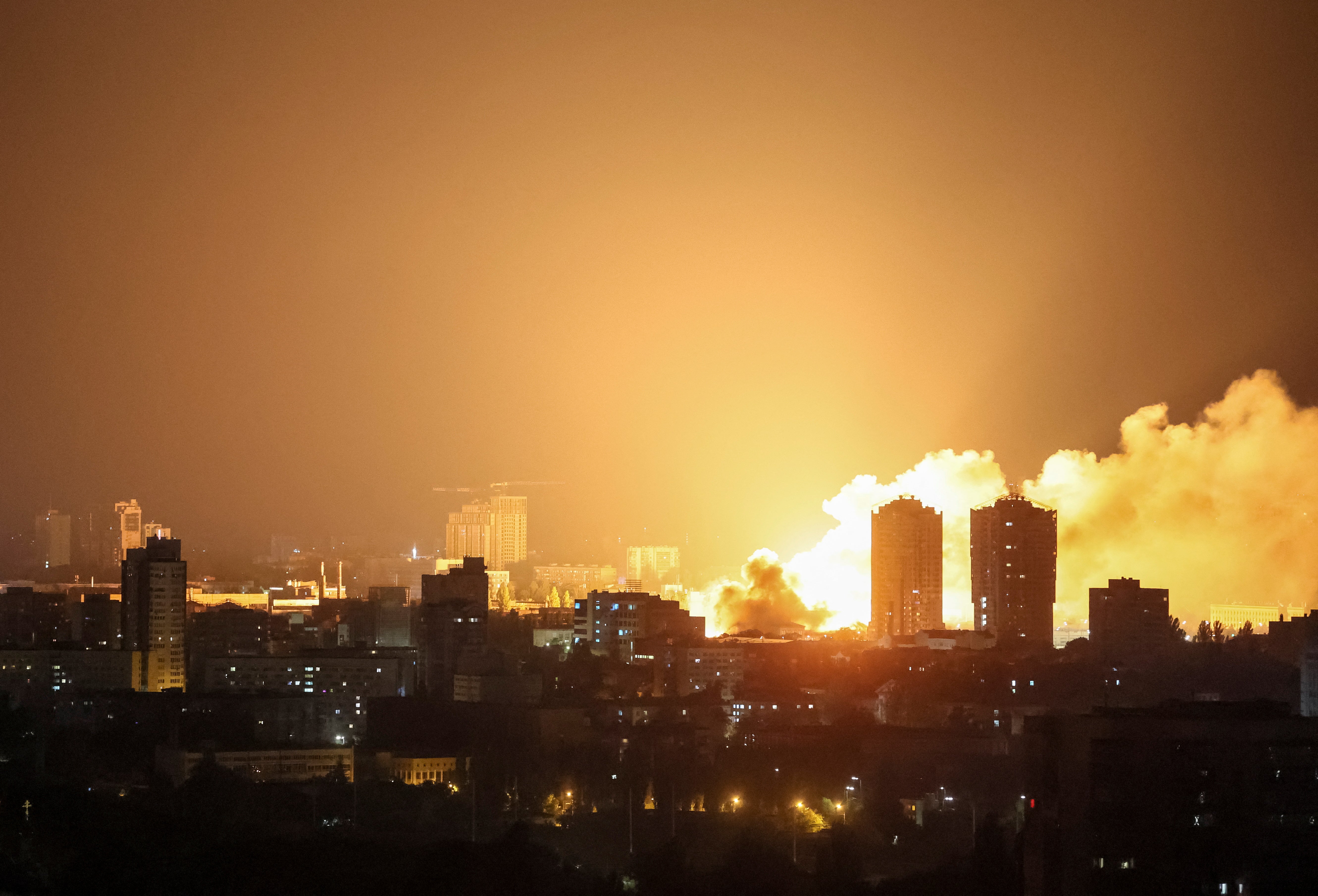 Fire and smoke rise in Kyiv after a Russian drone strike overnight