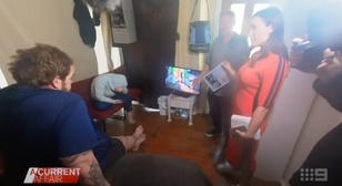 Squatters watch TV in retiree’s home while he gives news interview