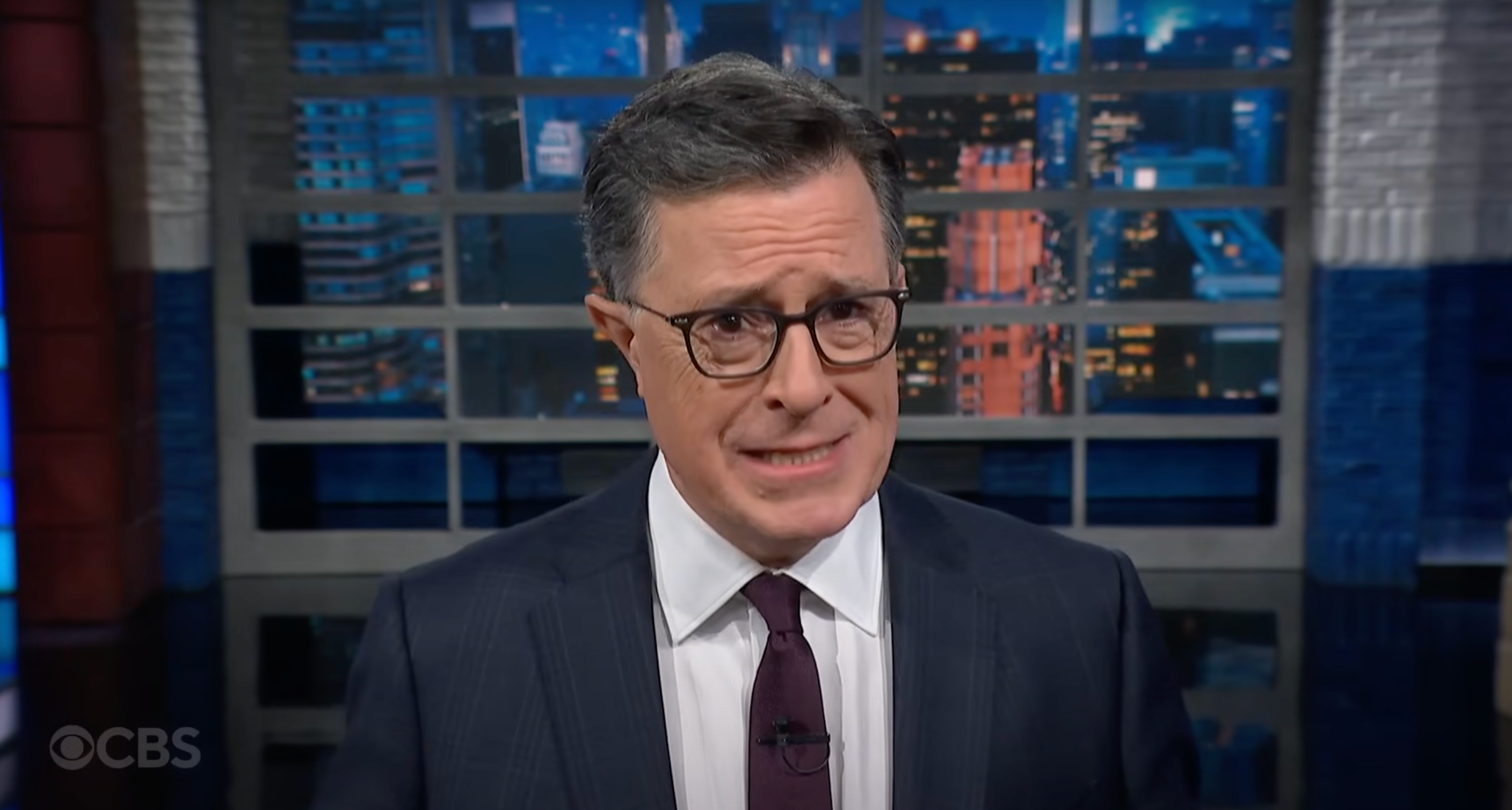 Stephen Colbert grimaced as he commented on Musk and Trump's feud going nuclear
