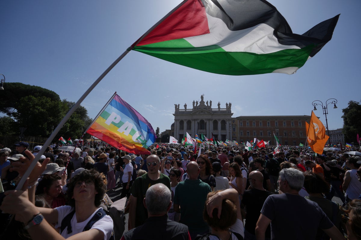 Thousands of demonstrators march through Rome to call for an immediate end to the war in Gaza