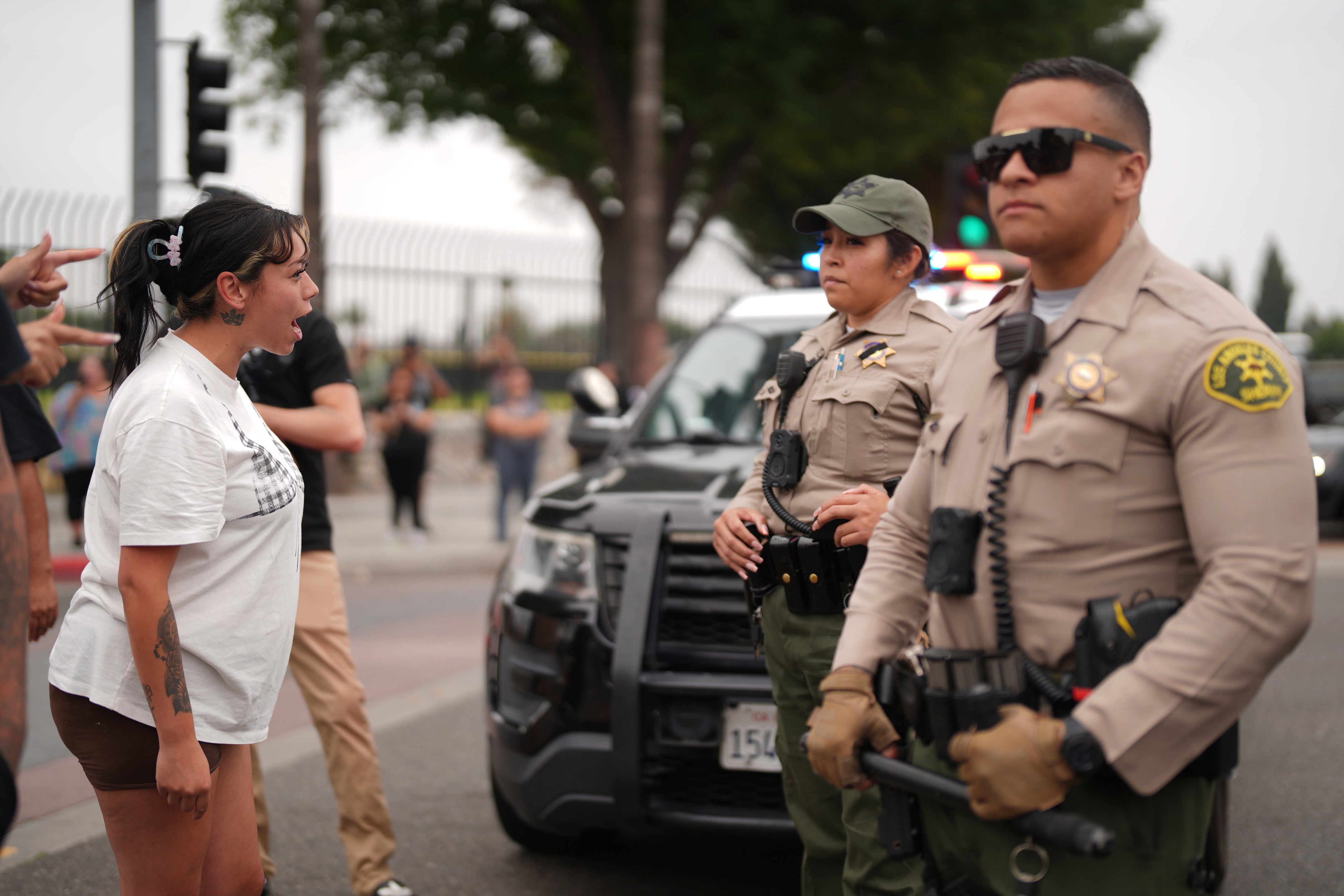 Protester is complied with the implementation of the Law outside the industrial park in the lower