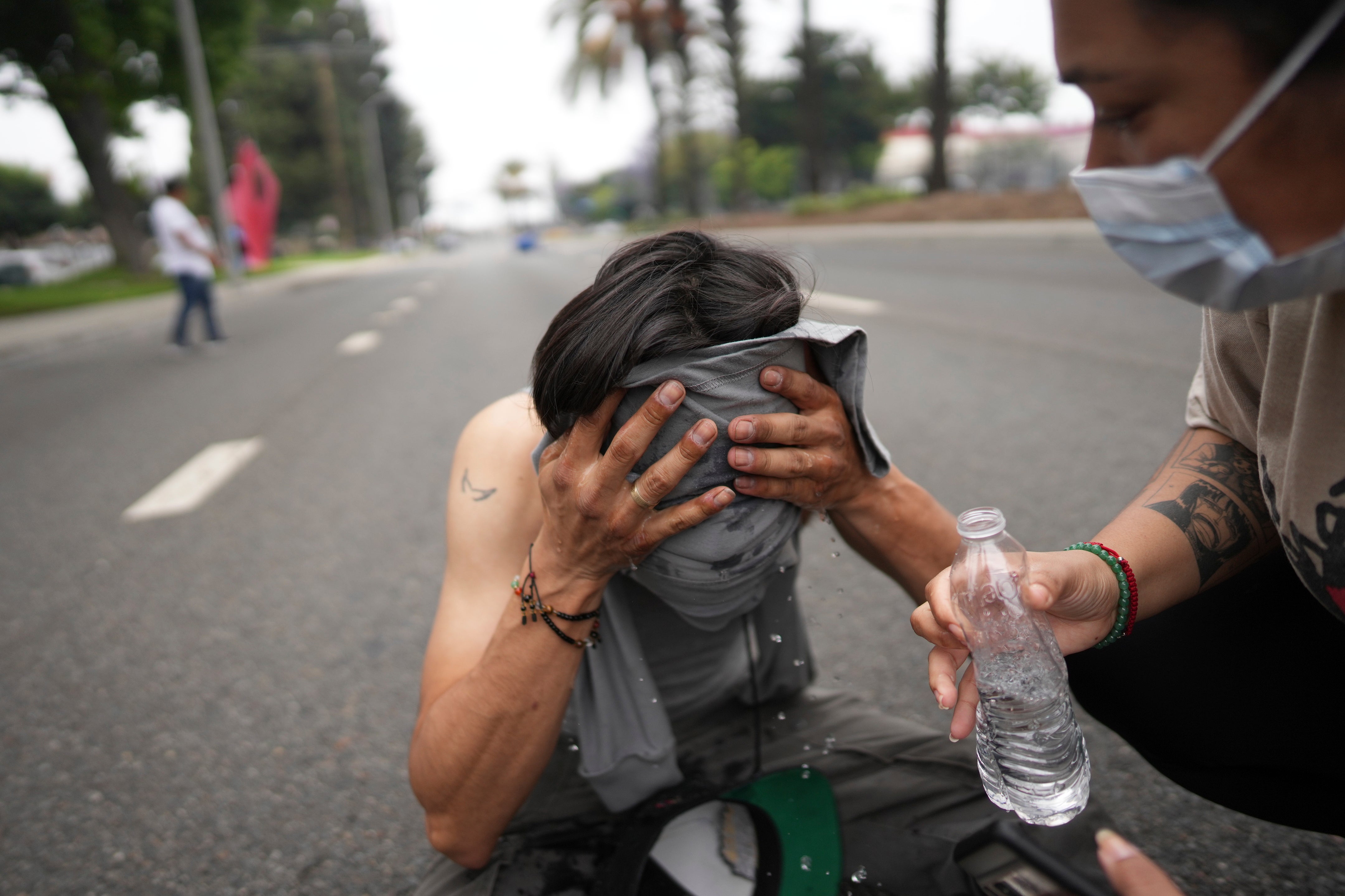 The Protement is given help after the police reported tear gas