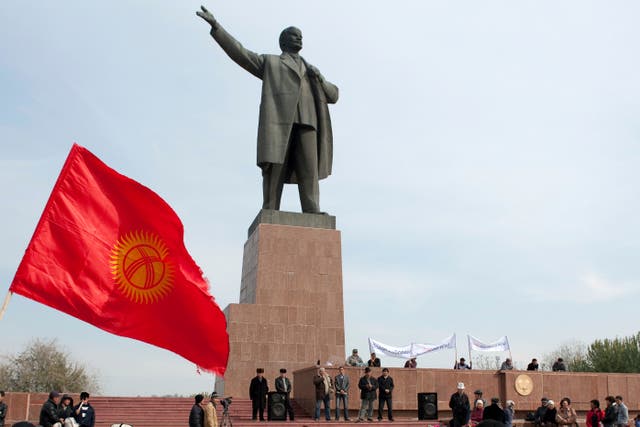 <p>Protesters rally in front of a statue of Soviet Union founder Vladimir Lenin on a central square in the southern Kyrgyz city of Osh, Kyrgyzstan, on Thursday, Nov. 3, 2011. (AP Photo/Nicolas Tanner, File)</p>