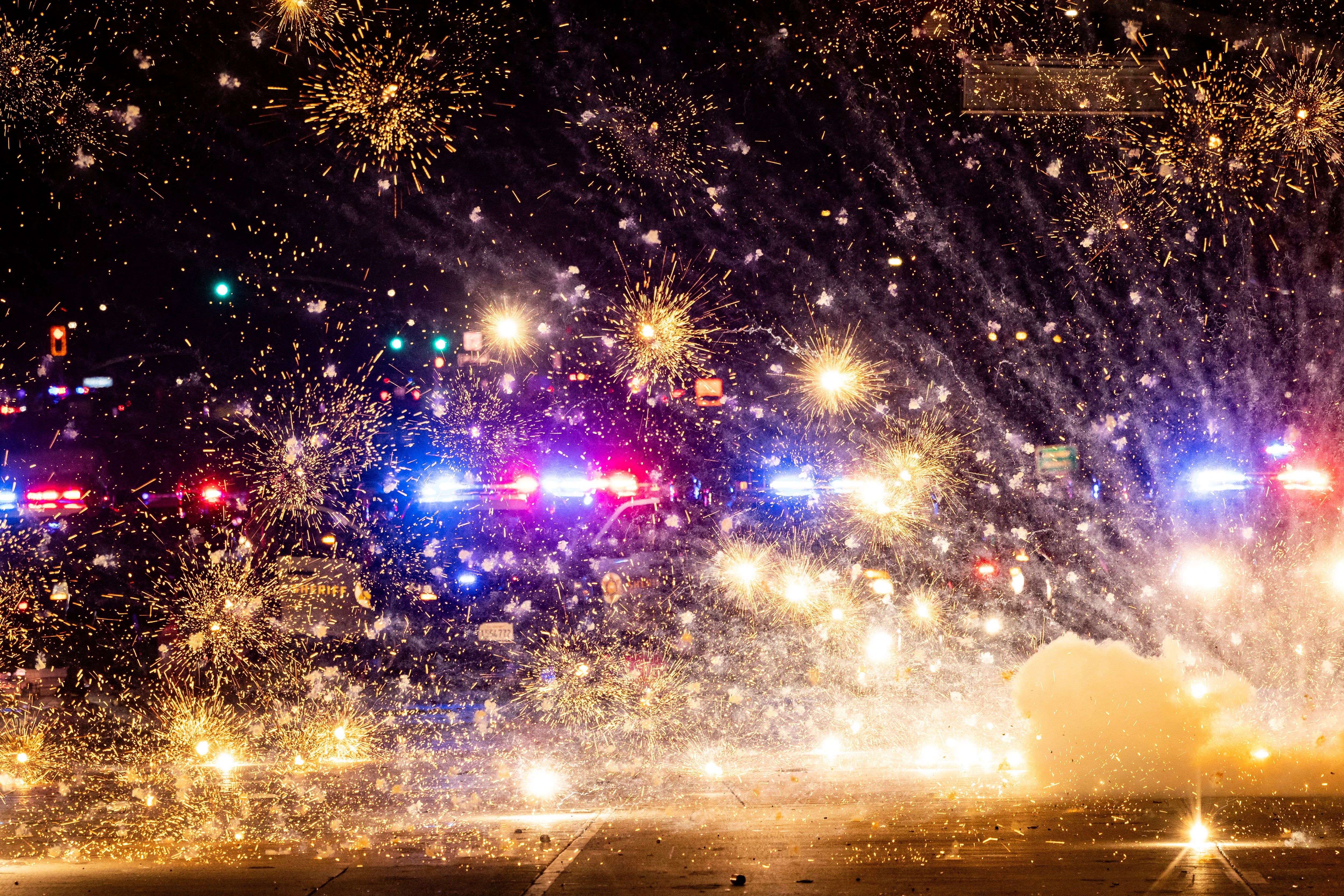 Footage shared online showed an escalation in the clashes between demonstrators and law enforcement with police in riot gear using tear gas to disperse people in Los Angeles on Saturday night and Sunday morning