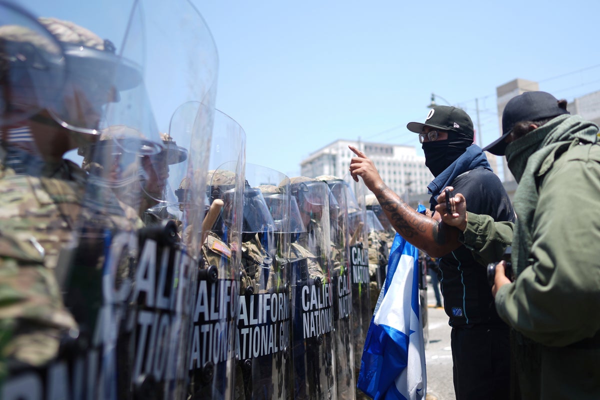 Trump orders law enforcement to ‘liberate’ LA from ‘migrant invasion’ amid clashes over ICE raids
