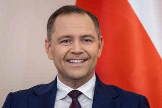 President-elect Karol Nawrocki looks on during his meeting with President Andrzej Duda