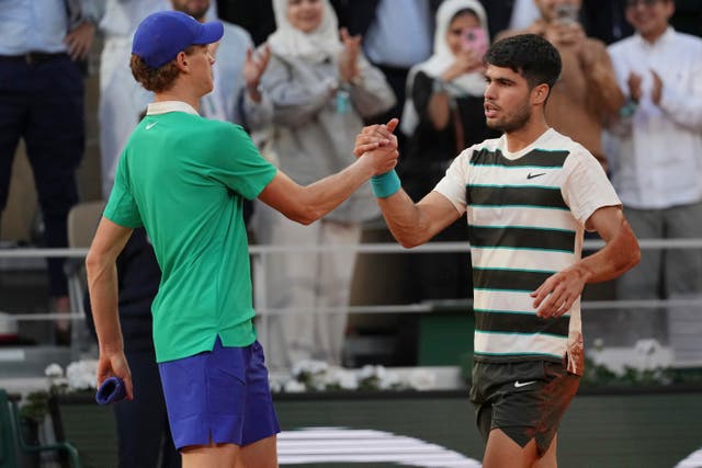 Carlos Alcaraz, right, and Jannik Sinner are the dominant forces in men’s tennis (Thibault Camus/AP)