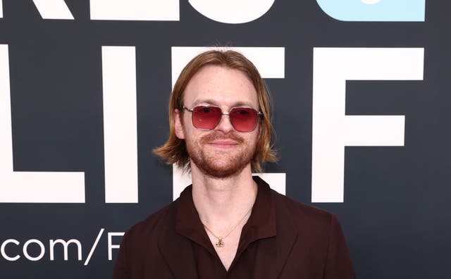 <p>Finneas attended the LA immigration protests, where he claimed he was tear-gassed by the National Guard</p>