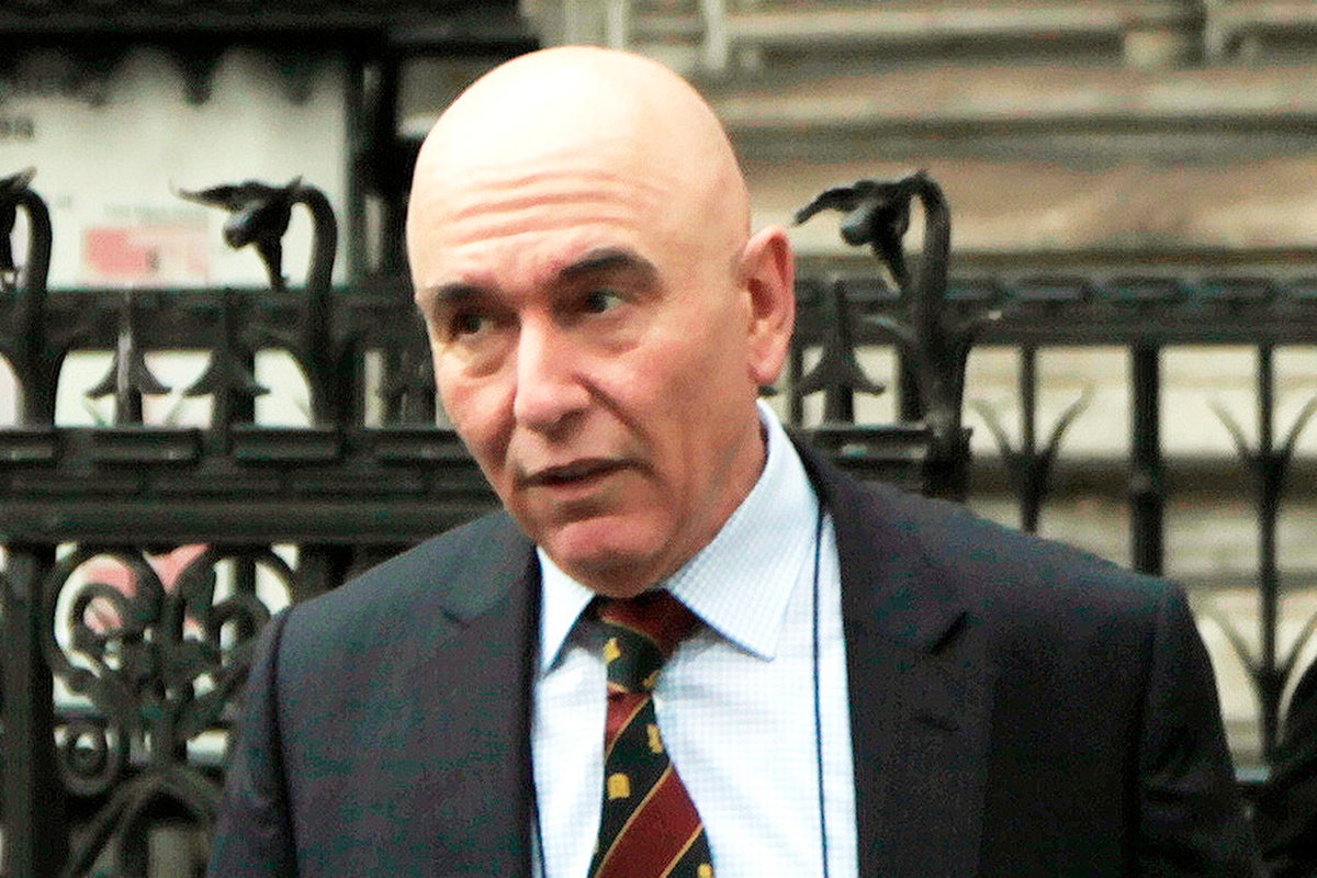 Cambridge professor cleared of faking poor IQ test in £1m compensation claim