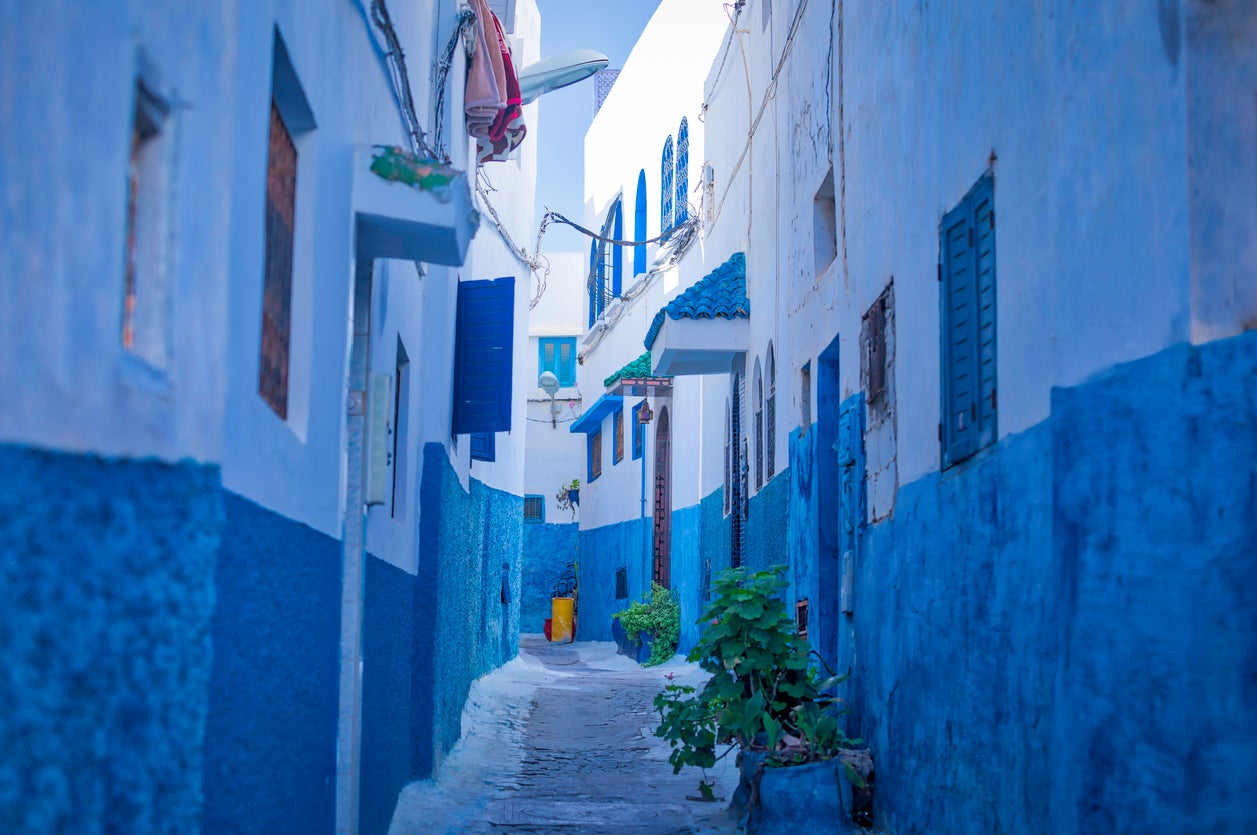 Narrow streets and white and blue painted buildings Kasbah Udajda in Rabat, Morocco