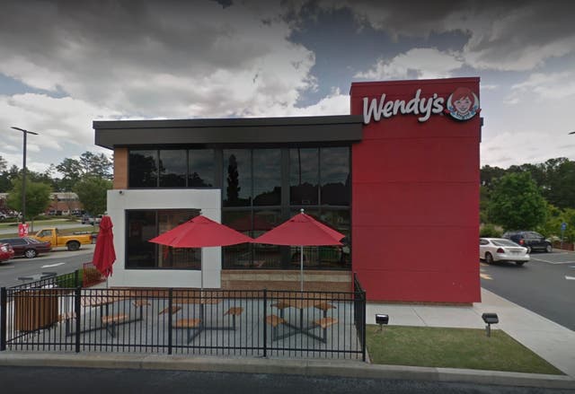 <p>A Wendy's restaurant in Covington, Georgia, where a Texas sheriff forgot his firearm in a bathroom this weekend, leading a 15-year-old to accidentally find it and discharged the weapon</p>