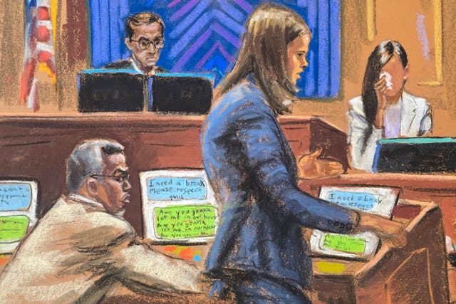 <p>Sean 'Diddy' Combs's ex-girlfriend 'Jane' dabs her eyes with a tissue as prosecutor Maurene Comey questions her</p>